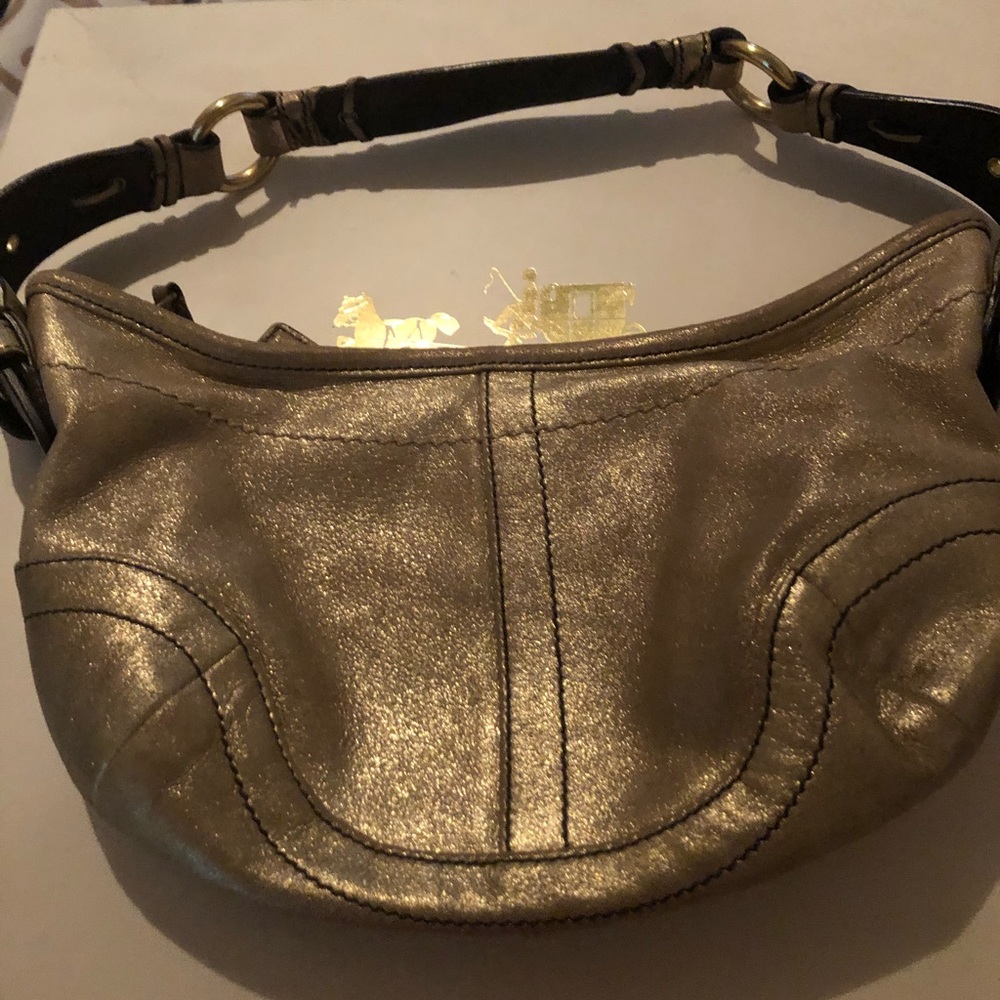 Coach gold purse in good condition